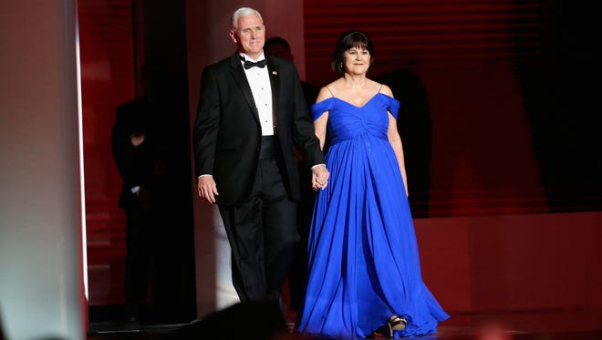 Vice President Mike Pence and wife Karen Pence attend the Liberty Inaugural Ball in Washington.