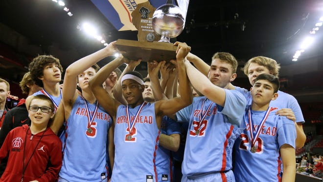 Arrowhead holds the runner-up trophy after their loss to Stevens Point in the Division 1 championship game.