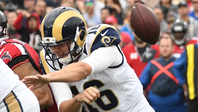 Rams quarterback Jared Goff (16) throws an incomplete pass in the second quarter against the Falcons.