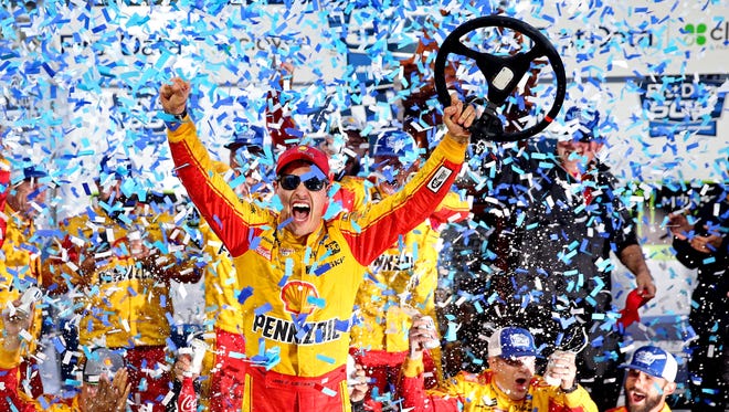 Joey Logano celebrates winning the First Data 500 at Martinsville Speedway, his second win of 2018.