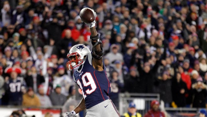 Patriots receiver Malcolm Mitchell celebrates his first-half touchdown catch against the Ravens.