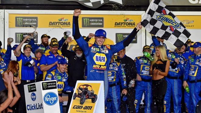 Chase Elliott celebrates with his team after winning the first Can-Am Duel at Daytona Thursday night.