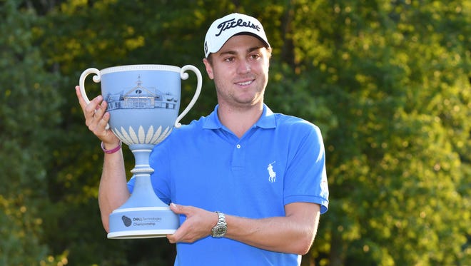 Sep 4, 2017; Norton, MA, USA; Justin Thomas poses with the Dell Technologies Championship trophy after winning the golf tournament at TPC of Boston. Mandatory Credit: Mark Konezny-USA TODAY Sports