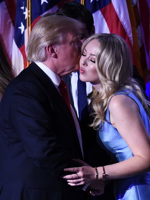 Tiffany Trump gets a kiss from her dad after his speech at the New York Hilton Midtown on Election Day.