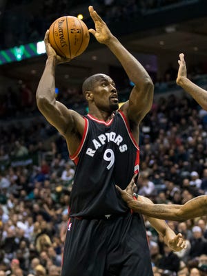 Toronto Raptors forward Serge Ibaka shoots over Milwaukee Bucks guard Jason Terry during the second quarter in Game 6 of the first round of the 2017 NBA Playoffs.