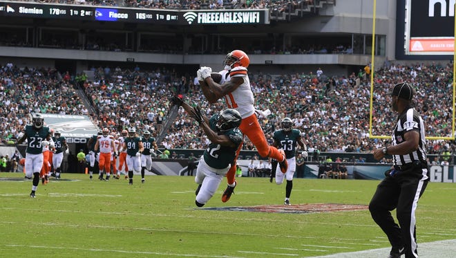 Cleveland Browns wide receiver Terrelle Pryor (11) makes a catch over Philadelphia Eagles cornerback Nolan Carroll (22) in the second quarter at Lincoln Financial Field.