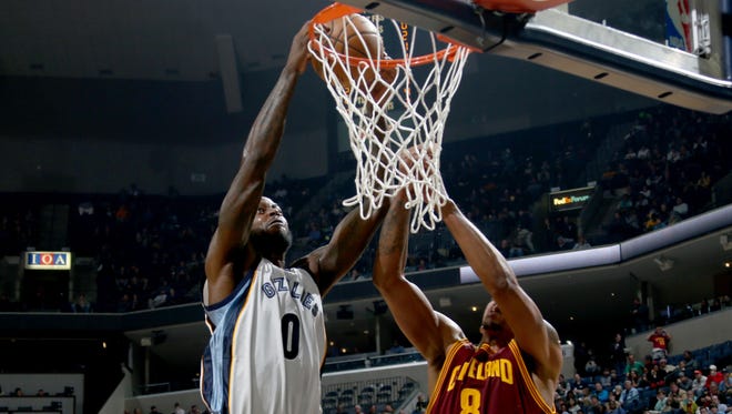 Memphis Grizzlies JaMychal Green gets a put back over Cleveland Cavaliers Channing Frye.