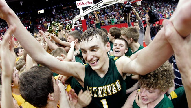 Sam Dekker scored 40 points and the game-winning three-pointer with about 4 seconds left in Sheboygan Lutheran's dramatic 67-66 victory in the Division 5 boys state championship game in 2012. Dekker scored 12 points in the game’s closing 50 seconds to lead the comeback win in one of the greatest performances in state tournament history. His 75 points in his two tournament games are the most ever in Division 5.