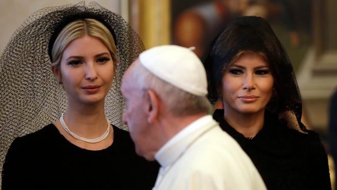 Pope Francis walks past Ivanka Trump, left, and First Lady Melania Trump at the Vatican on May 24, 2017.