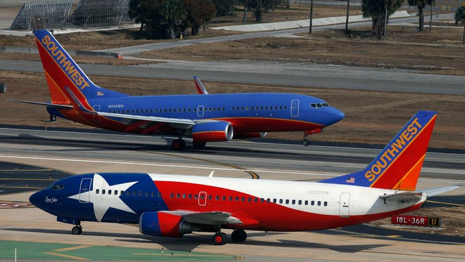 Southwest's "Lone Star One" taxis to the gate at Tampa International Airport on Jan. 20, 2010.