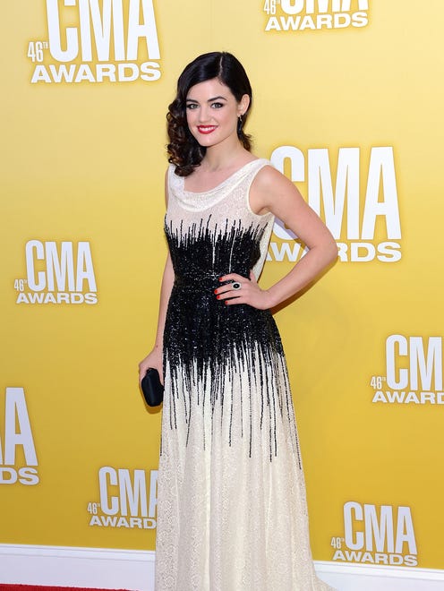 NASHVILLE, TN - NOVEMBER 01:  Singer/actress Lucy Hale attends the 46th annual CMA Awards at the Bridgestone Arena on November 1, 2012 in Nashville, Tennessee.  (Photo by Jason Kempin/Getty Images) ORG XMIT: 152179855 ORIG FILE ID: 155114507