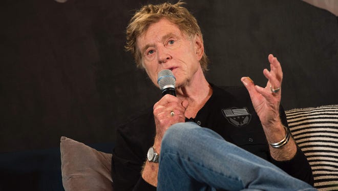 Actor/filmmaker Robert Redford addresses journalists at a press conference on opening day of the Sundance Film Festival in Park City, Utah.