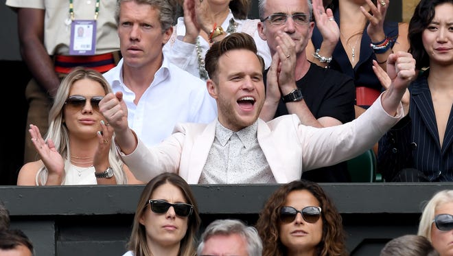 Singers Olly Murs and Louisa Johnson attend day nine.