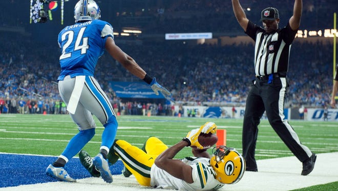Packers wide receiver Davante Adams (17) scores a touchdown during the fourth quarter against the Lions.