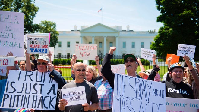 Protesters at the White House on May 10, 2017.