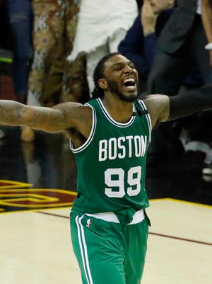 Boston Celtics forward Jae Crowder (99) celebrates a three point basket by guard Avery Bradley (not pictured) in the fourth quarter against Cleveland Cavaliers in Game 3 of the Eastern Conference finals.