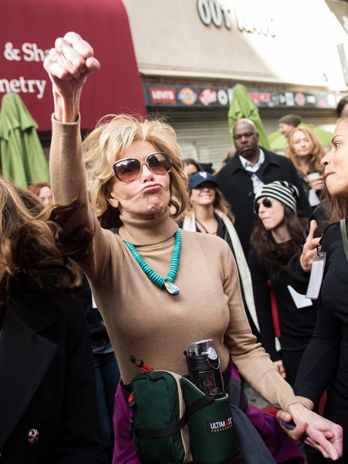 Veteran actress and long-time activist, Jane Fonda raises her fist in support of the Los Angeles Women's March on Saturday.