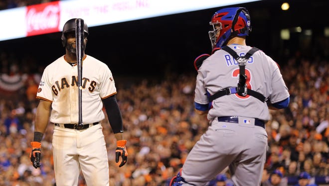 Game 4 in San Francisco: Giants center fielder Denard Span reacts to a called strike three during the sixth inning.