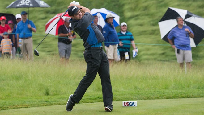 Canadian golfer Corey Conners hits off the first tee  during practice rounds for the U.S. Open Golf Championship.
