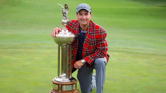 May 28: Dean & Deluca Invitational winner Kevin Kisner poses with the Marvin Leonard Trophy after the final round of the Dean & Deluca Invitational golf tournament at Colonial Country Club. Mandatory Credit: Erich Schlegel-USA TODAY Sports ORG XMIT: USATSI-327614 ORIG FILE ID:  20170528_gav_si4_125.jpg