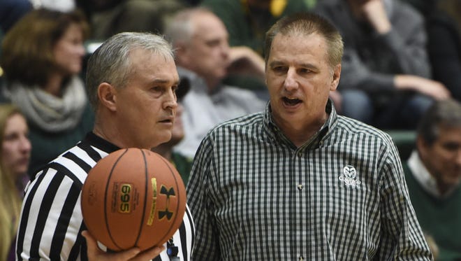 CSU coach Larry Eustachy speaks to a referee Feb. 25, 2015, at Moby Arena.