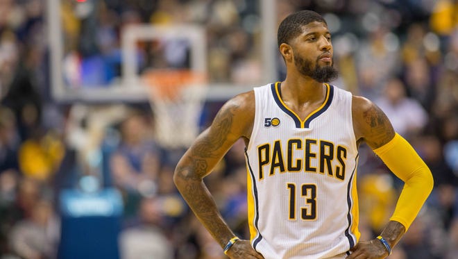 Indiana Pacers forward Paul George (13) says he's doing what he loves to do.