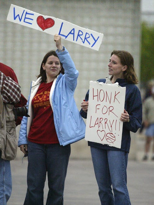 Jamie Luedtke, left and Kristin Johannsen show support for Larry Eustachy outside the Jacobson Building at ISU prior to the announcement by ISU athletic director Bruce Van De Velde that Eustachy has been suspended. Register photo by Mary Chind (April 30, 2003)-

-Caption:  Showing support: Jamie Luedtke, left, and Kristin Johannsen show support for Larry Eustachy outside the Jacobson Building in Ames on Wednesday.