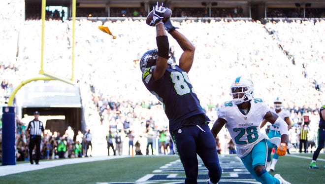 Seattle Seahawks wide receiver Doug Baldwin (89) catches a touchdown pass against the Miami Dolphins late in the fourth quarter.