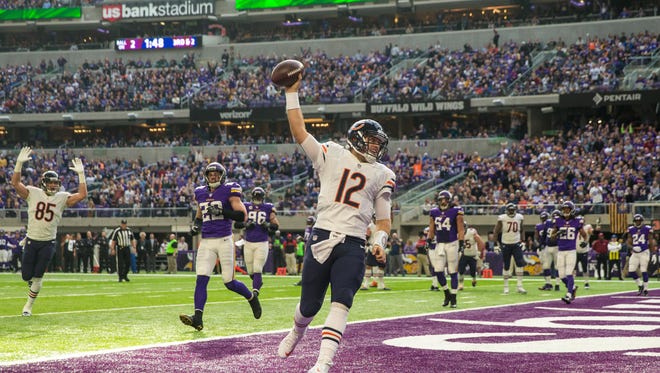 Chicago Bears quarterback Matt Barkley (12) celebrates his touchdown reception during the second quarter against the Minnesota Vikings at U.S. Bank Stadium.