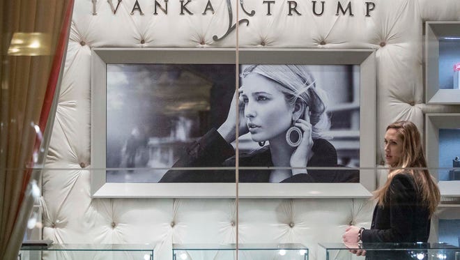 Lara Yunaska, wife of Eric Trump, son of President-elect Donald Trump, walks into the Ivanka Trump Collection store in the lobby of Trump Tower in New York.