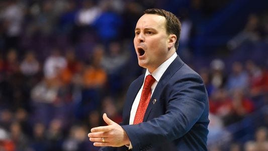 Dayton Flyers coach Archie Miller looks on during the first half of the first round against the Syracuse Orange in the 2016 NCAA Tournament at Scottrade Center.