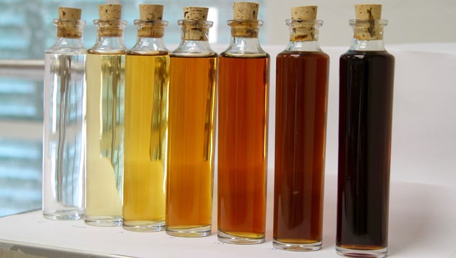 A line of samples showcases the range of colors that can be created depending on maturation time.