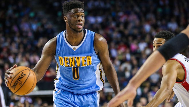 Emmanuel Mudiay dribbles the ball in a game against the Toronto Raptors.