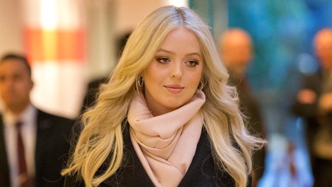 Tiffany Trump, daughter of President-elect Donald Trump and Marla Maples, walks through the lobby of Trump Tower.