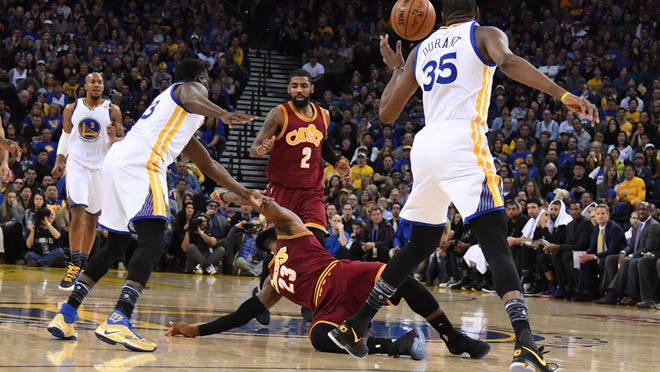 January 16, 2017; Oakland, CA, USA; Golden State Warriors forward Draymond Green (23) collides with Cleveland Cavaliers forward LeBron James (23) during the second quarter at Oracle Arena. Mandatory Credit: Kyle Terada-USA TODAY Sports ORG XMIT: USATSI-324594 ORIG FILE ID:  20170116_ter_st3_005.jpg