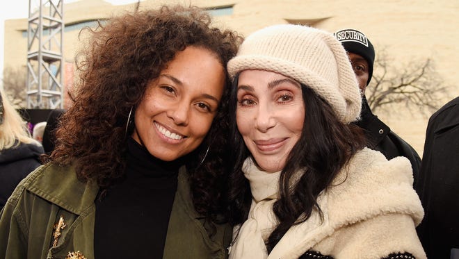 Alicia Keys and Cher get close at the Women's March on Washington rally, on Jan. 21, 2017.  Women's Marches are being held in cities around the world.
