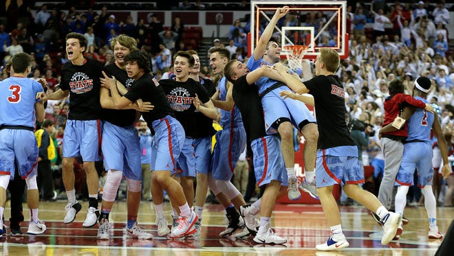 Arrowhead players celebrate their 63-62 win over Brookfield Central.