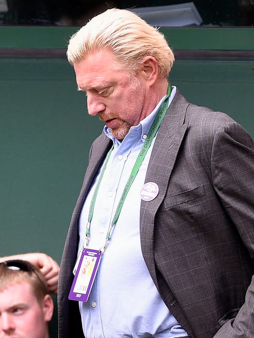 German former tennis champion Boris Becker arrives at the Wimbledon Championships.