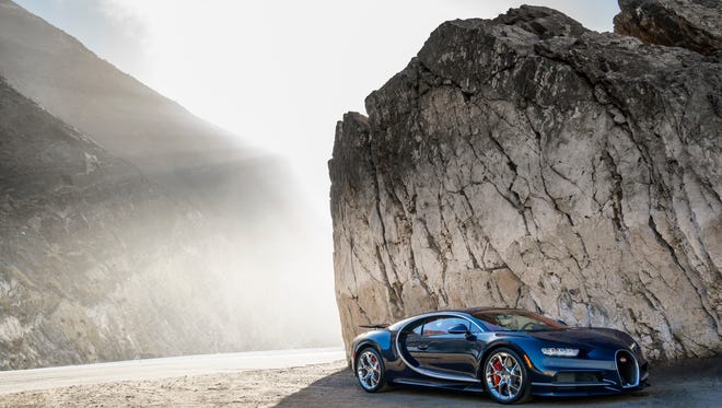 The Bugatti Chiron posing next to a rock formation at The Quail 2016: A Motorsports Gathering.