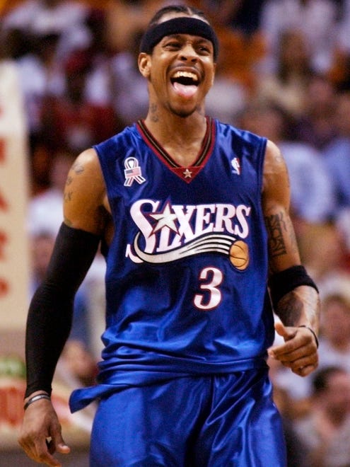 Allen Iverson celebrates in the final minute of a game against the Miami Heat.