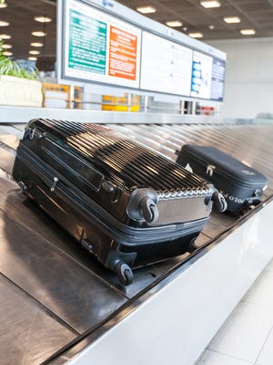 A four-wheeled rolling suitcase is less likely to get tossed around by airline baggage handlers.