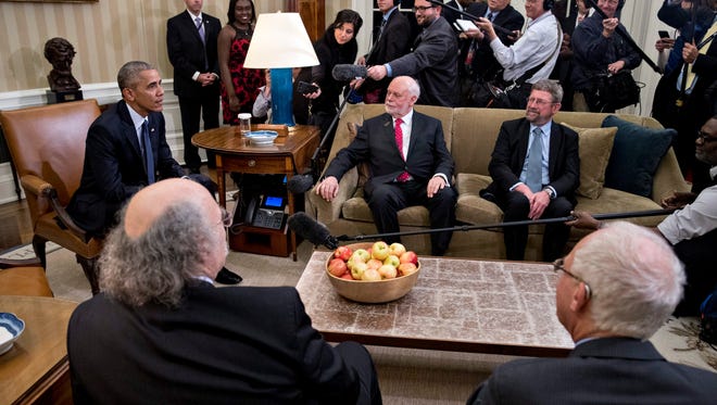 Obama meets with the 2016 American Nobel Prize laureates in the Oval Office on Nov. 30, 2016.