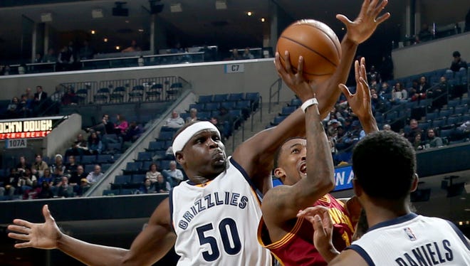 Memphis Grizzlies Zach Randolph defends Cleveland Cavaliers Jordan McRae.