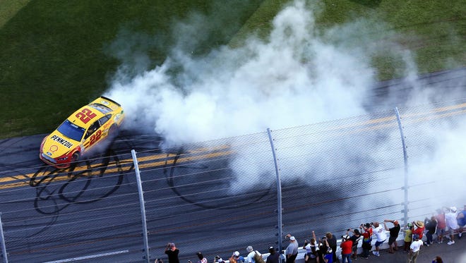 Joey Logano celebrates winning the 2015 Daytona 500.