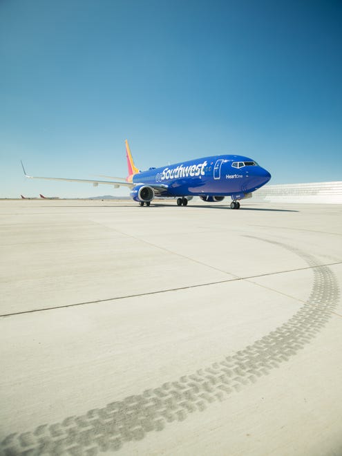 These photos released by Southwest show off its new “Heart” aircraft livery as well as its new logo and branding for its airport locations.
