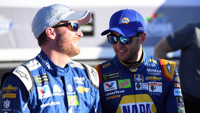 Chase Elliott (right) says he has no qualms about taking the pole from teammate Dale Earnhardt Jr.