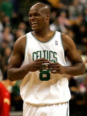 Boston Celtics' Antoine Walker laughs during the fourth quarter against his former team, the Atlanta Hawks.