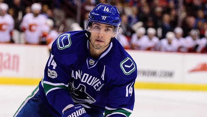 Alexandre Burrows has been traded by the Canucks to the Senators.