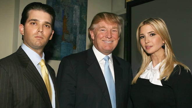 Donald Trump Jr., Donald Trump and Ivanka Trump gather in New York City on Oct. 10, 2007, to announce plans for their next venture.