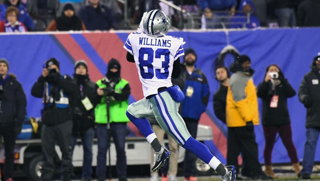 Cowboys wide receiver Terrance Williams (83) scores a first-quarter touchdown against the Giants.